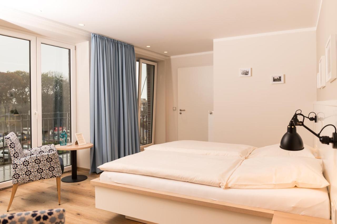 Mingers Hotel Neuharlingersiel Eksteriør billede